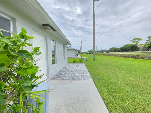 a view of a garden with pathway