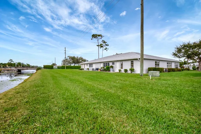 a view of a house with a big yard
