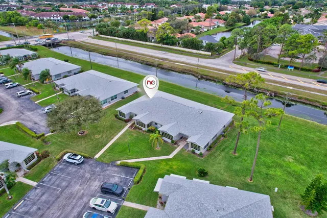 an aerial view of a house with a garden