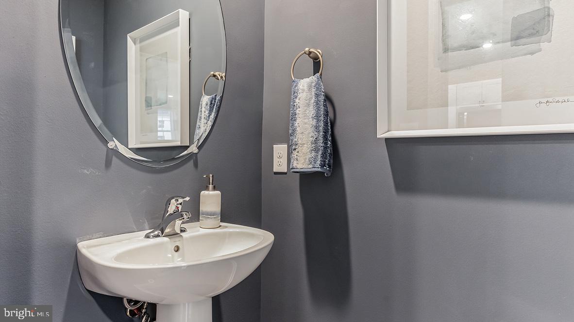 1162 Martin Road Breinigsville, PA 18031 - Photo 13 of 25 a bathroom with a sink and a mirror