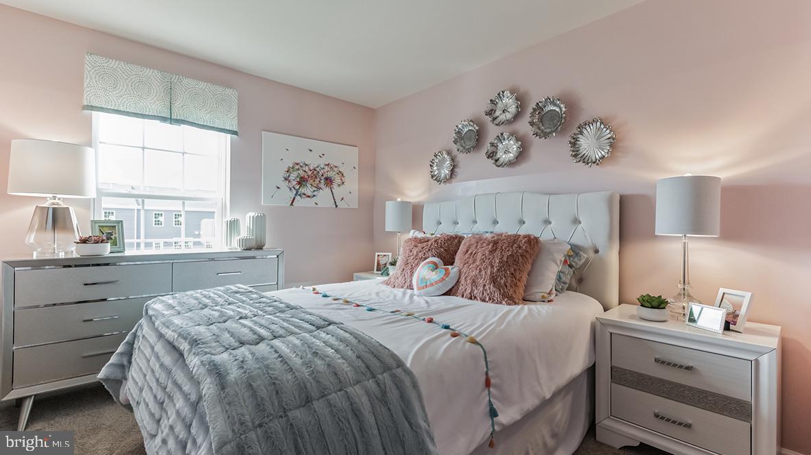 1162 Martin Road Breinigsville, PA 18031 - Photo 24 of 25 a bedroom with a large bed and a window