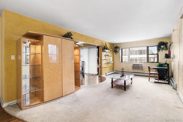 a living room with furniture and a area