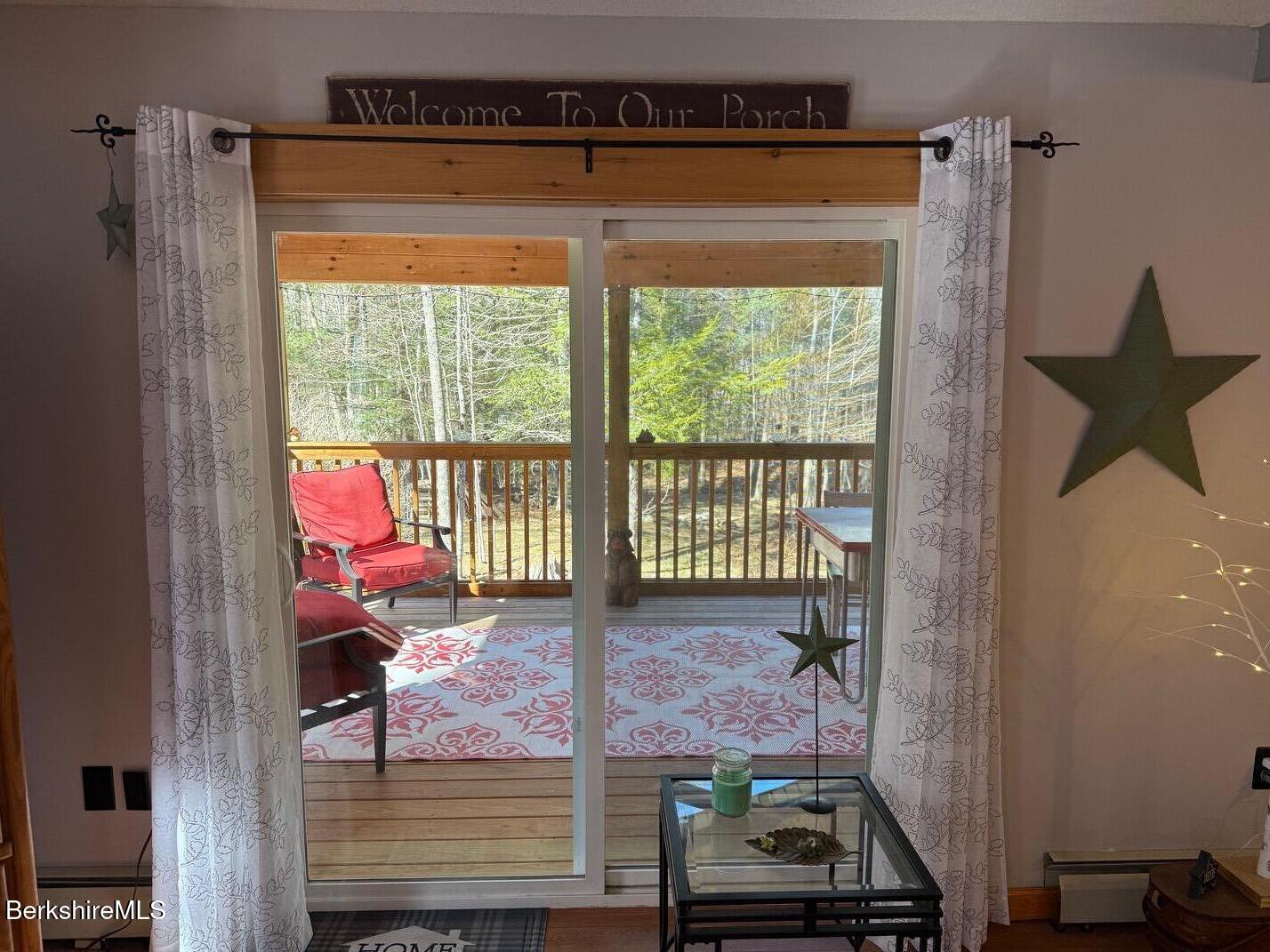1196 Bancroft Road Becket, MA 01223 - Photo 20 of 46 slider to enclosed porch
