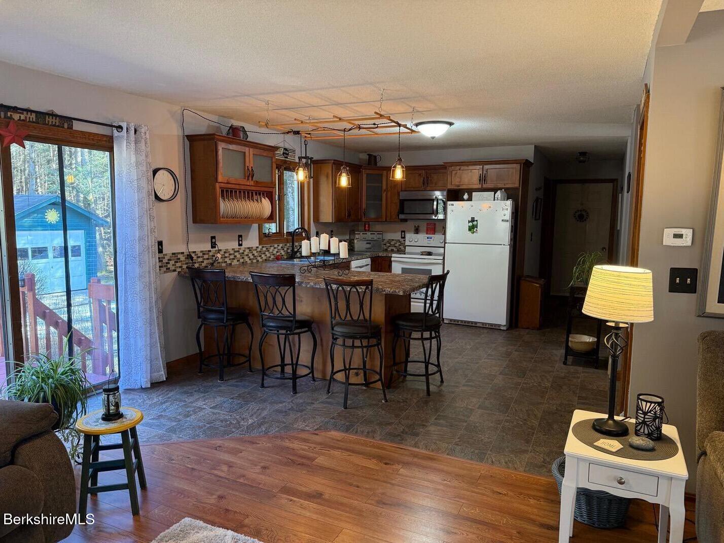 1196 Bancroft Road Becket, MA 01223 - Photo 28 of 46 open kitchen/living room