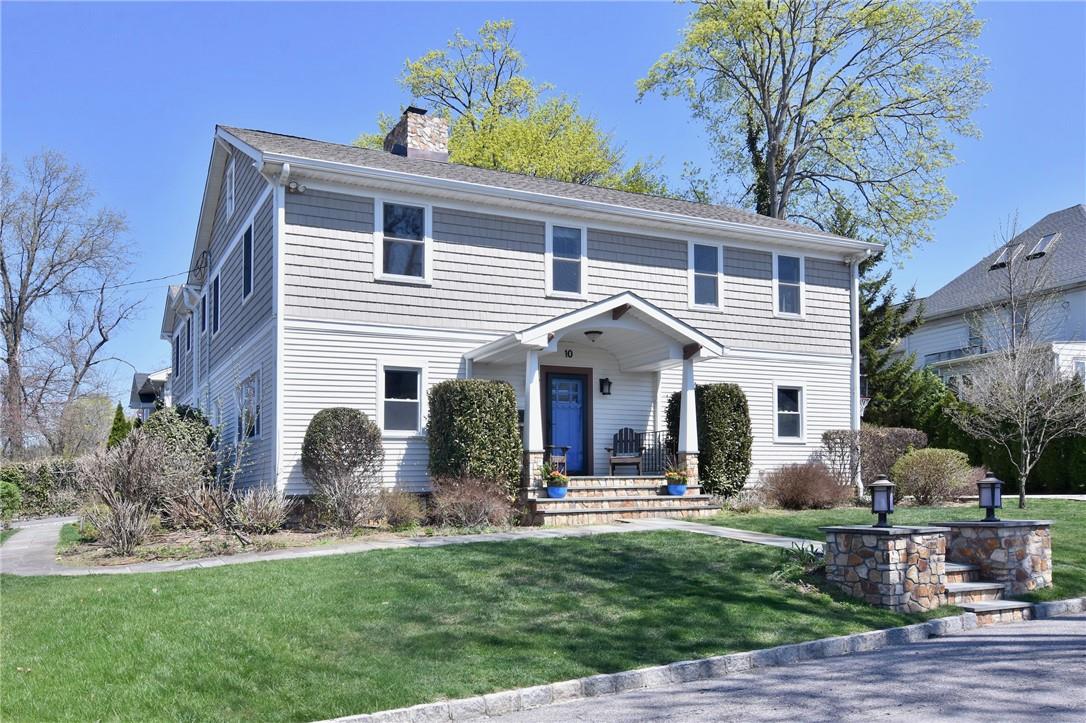 10 Bogert Place Bronxville, NY 10708 - Photo 1 of 1 a front view of house with yard and green space