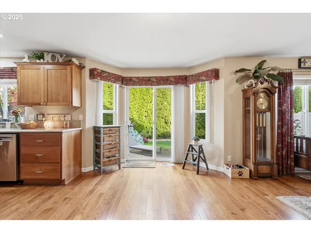 a room with a bed and a large window