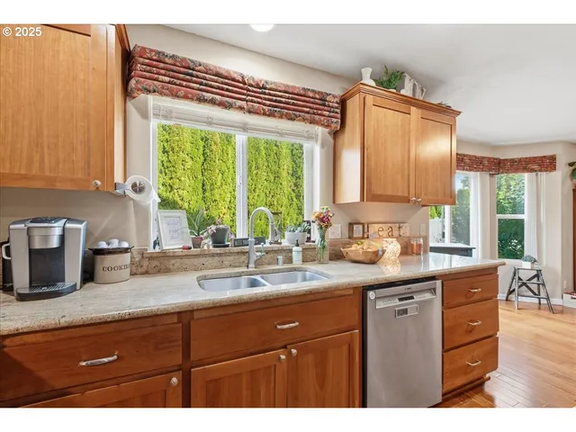 a kitchen with a sink and a window