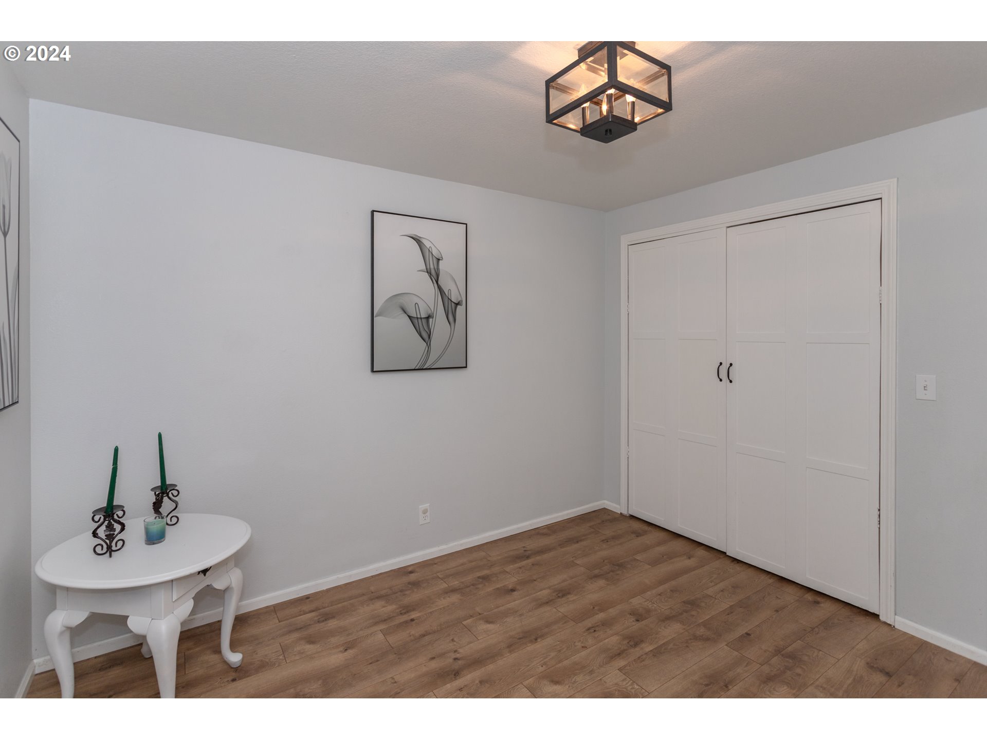 1690 Ridgley Boulevard Eugene, OR 97401 - Photo 14 of 30 a view of a room with a table and wooden floor
