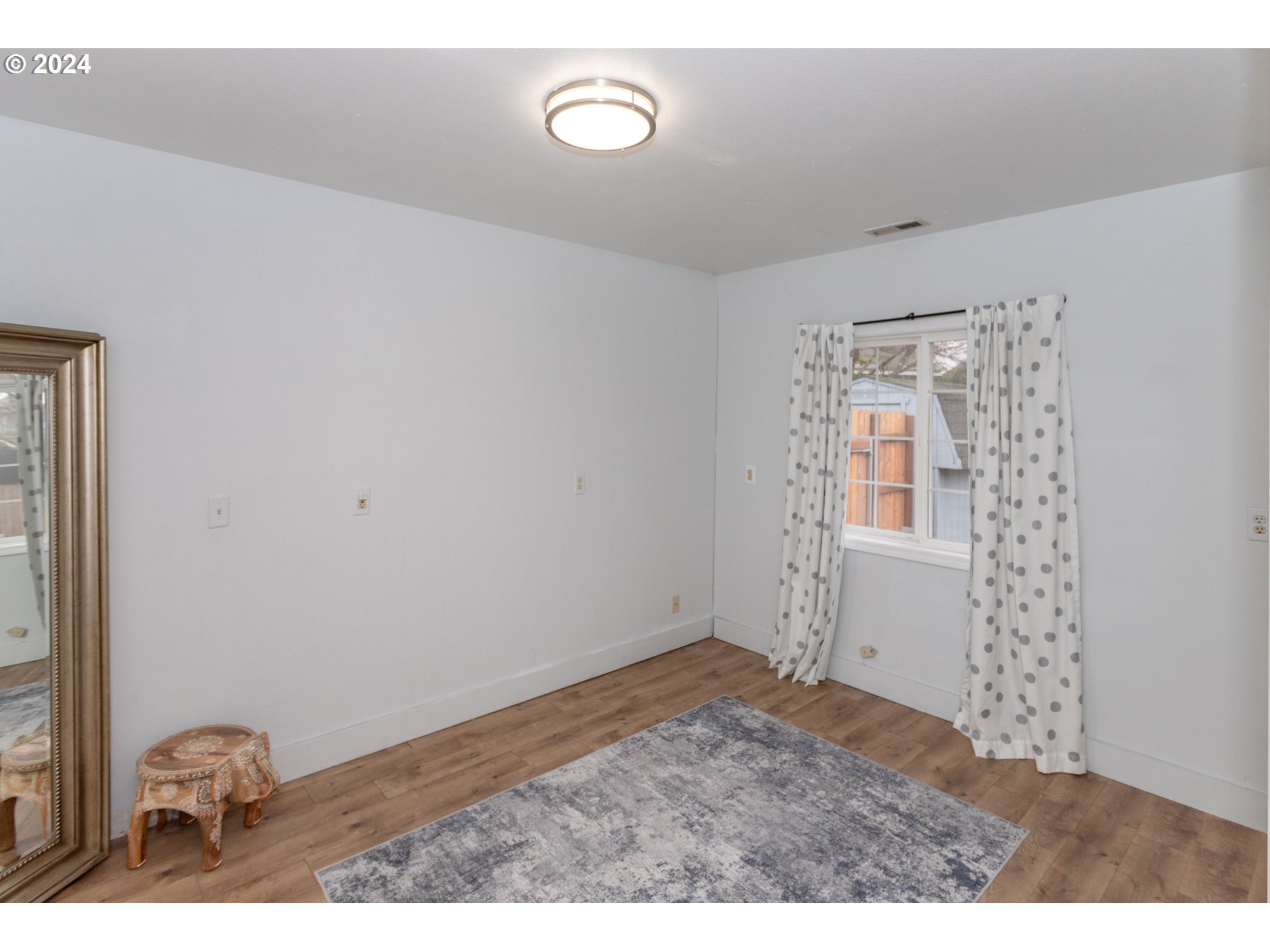 1690 Ridgley Boulevard Eugene, OR 97401 - Photo 18 of 30 a view of wooden floor in a room