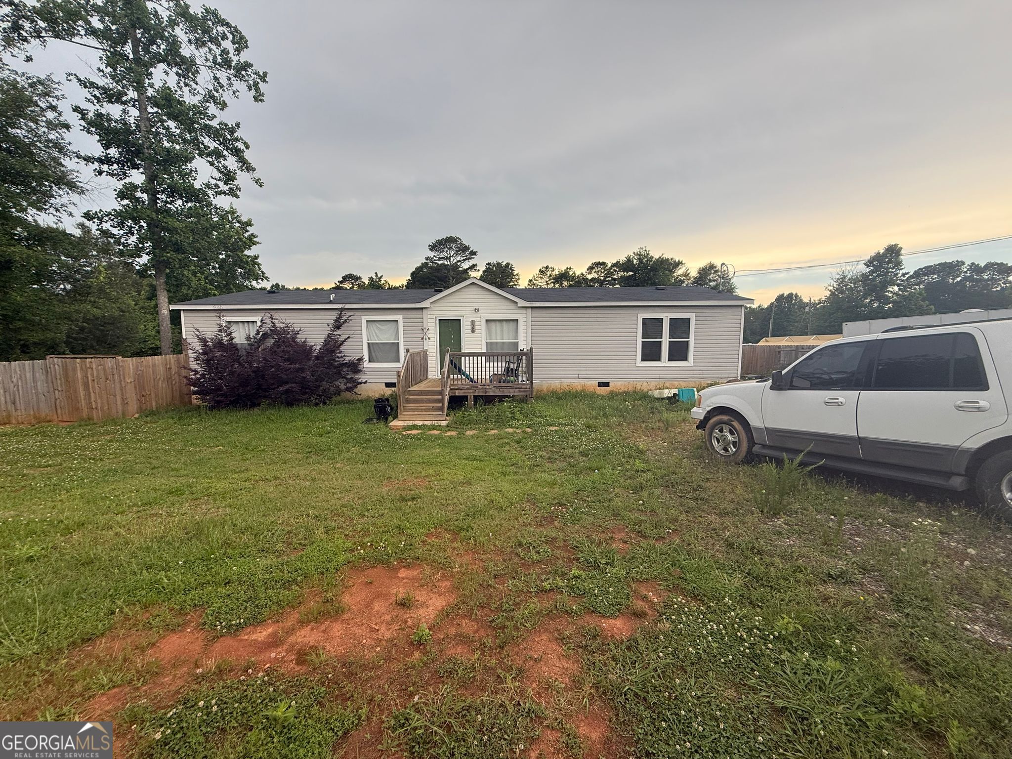 126 Southgate Road Alto, GA 30510 - Photo 1 of 14 a view of a house with a yard and sitting area