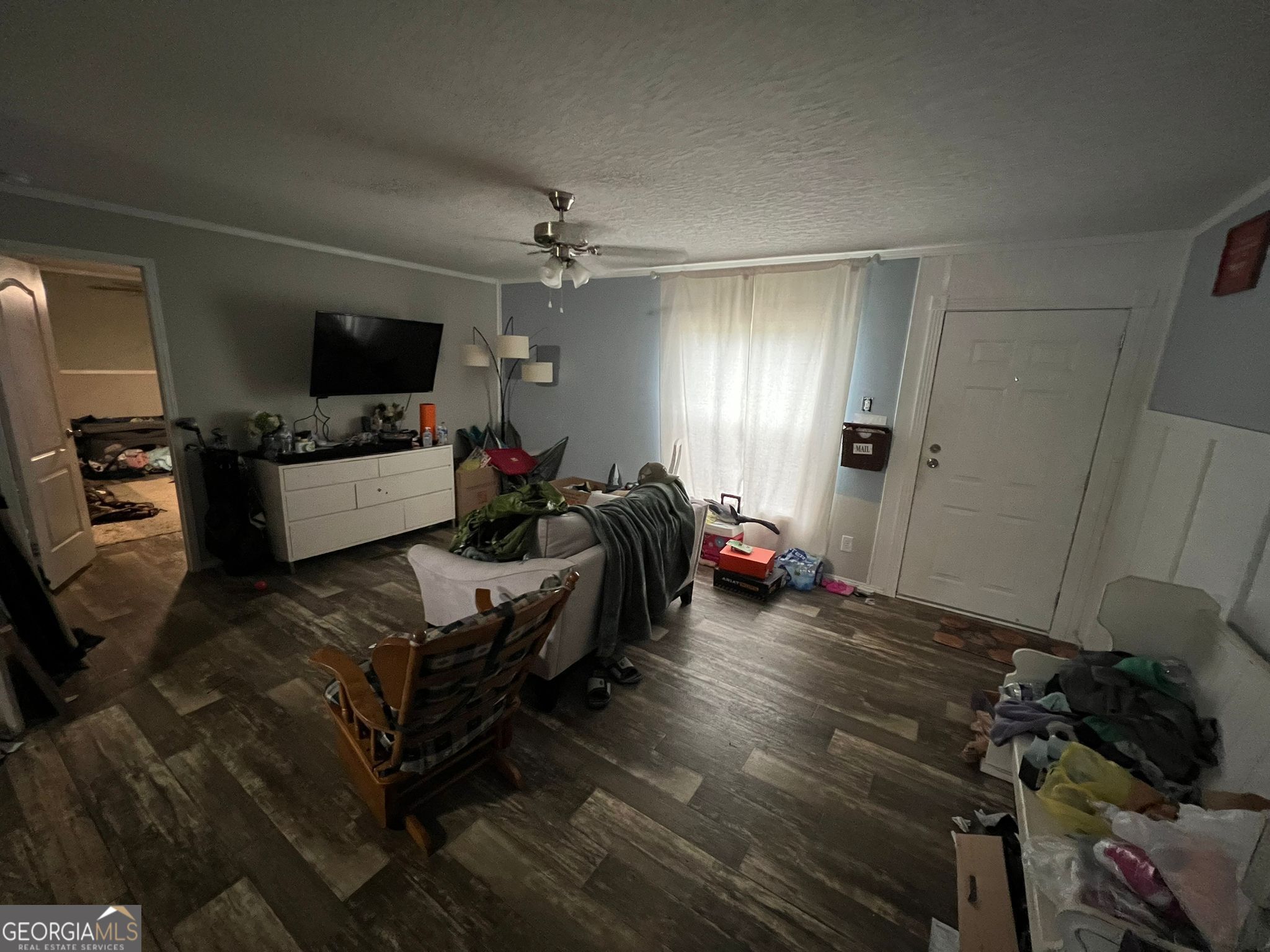 126 Southgate Road Alto, GA 30510 - Photo 13 of 14 a living room with furniture and a flat screen tv