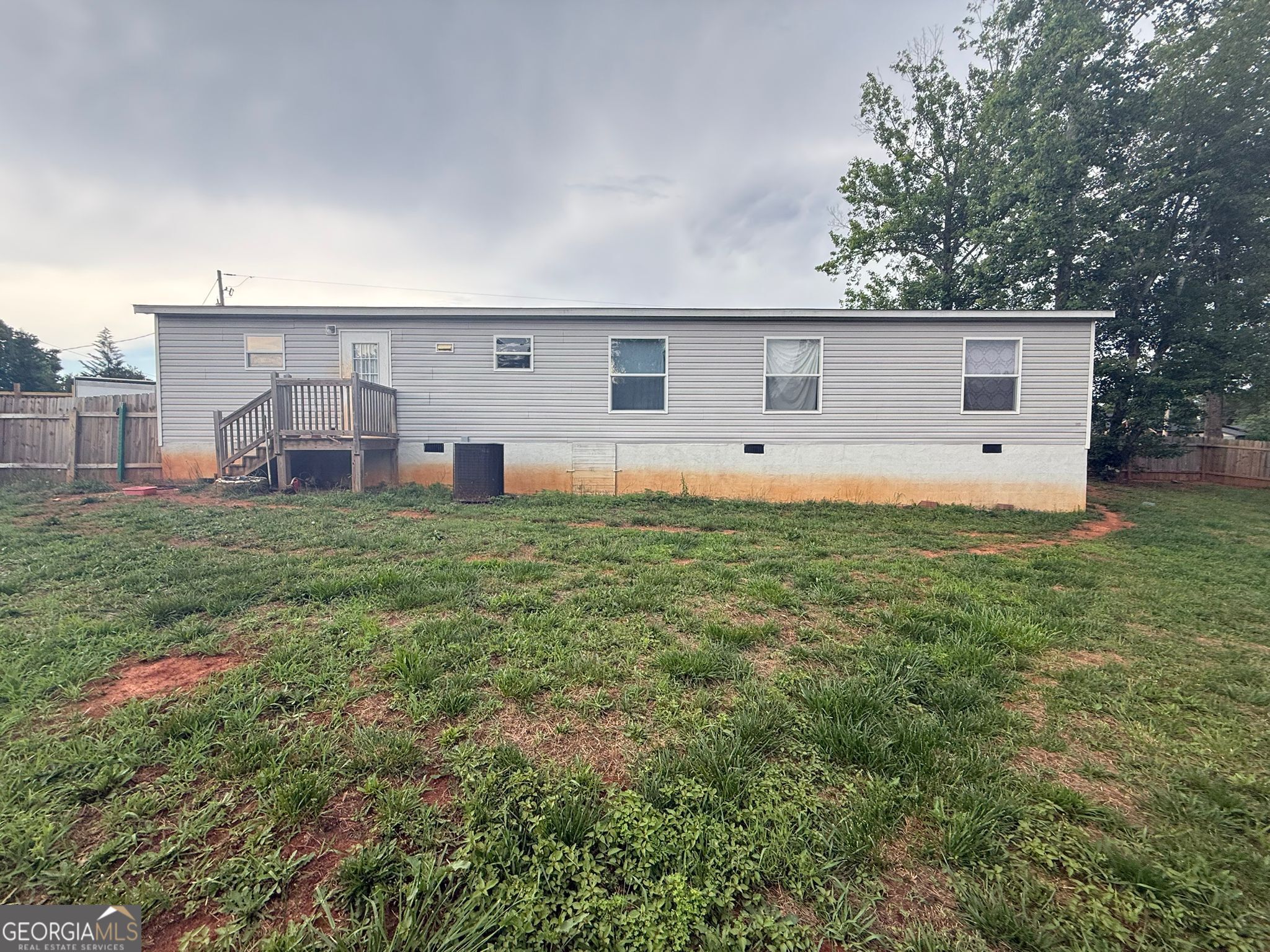 126 Southgate Road Alto, GA 30510 - Photo 2 of 14 a view of a house with a yard