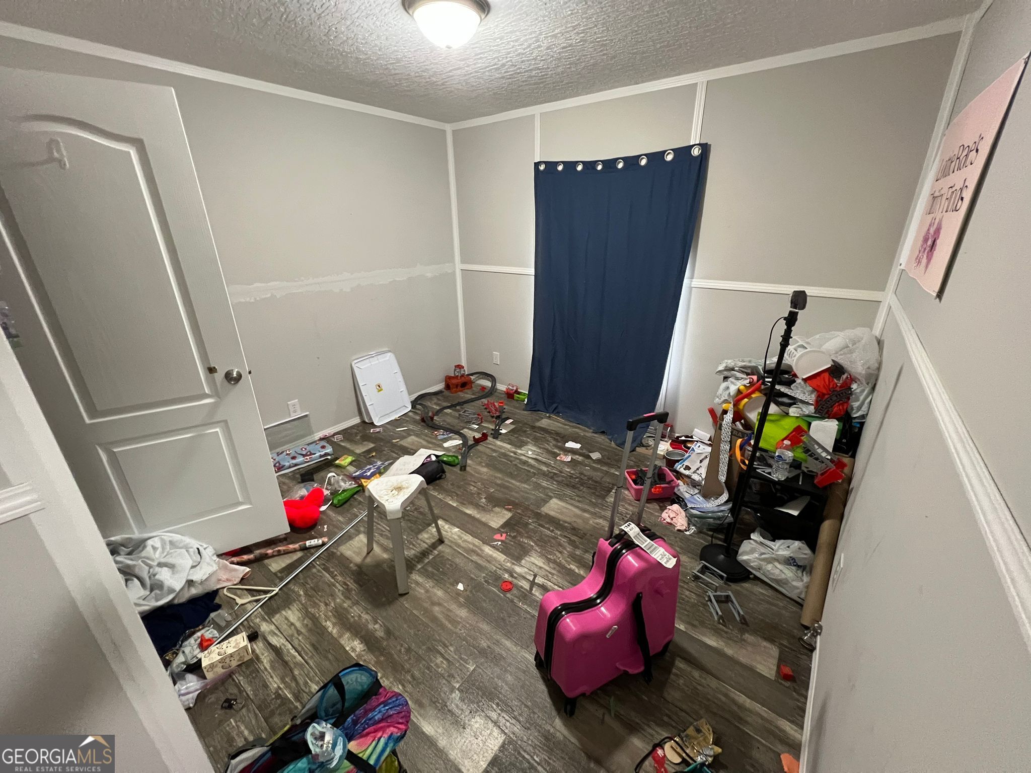 126 Southgate Road Alto, GA 30510 - Photo 6 of 14 a with a couch sitting in a shelf