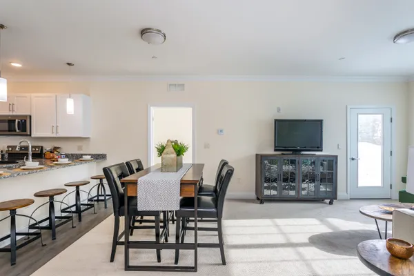 a view of a dining room with furniture