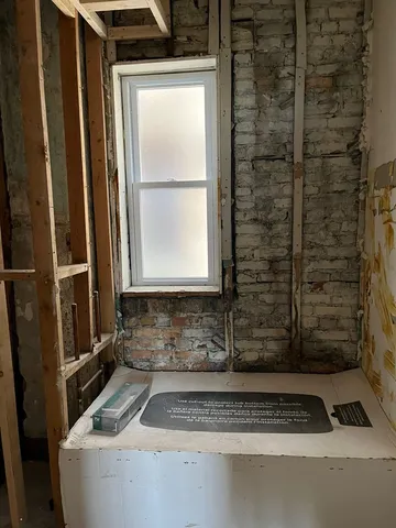 a view of a room with a window