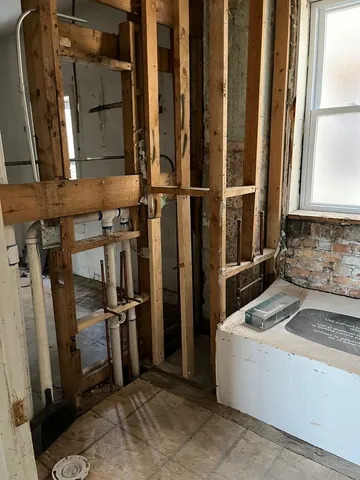 a front view of a house with parking garage