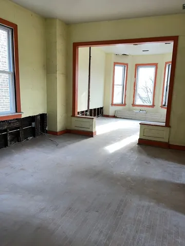 an empty room with windows