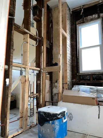 a view of a hallway with an entryway