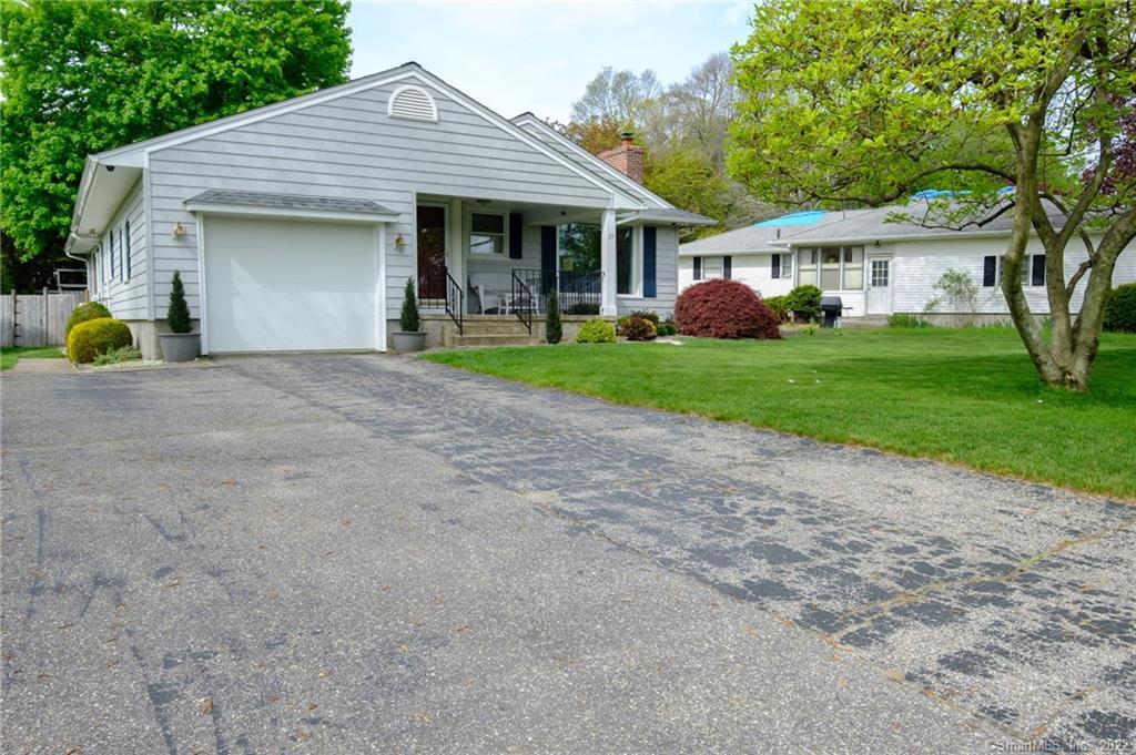 39 Sherwood Road Waterbury, CT 06708 - Photo 1 of 1 a front view of a house with garden