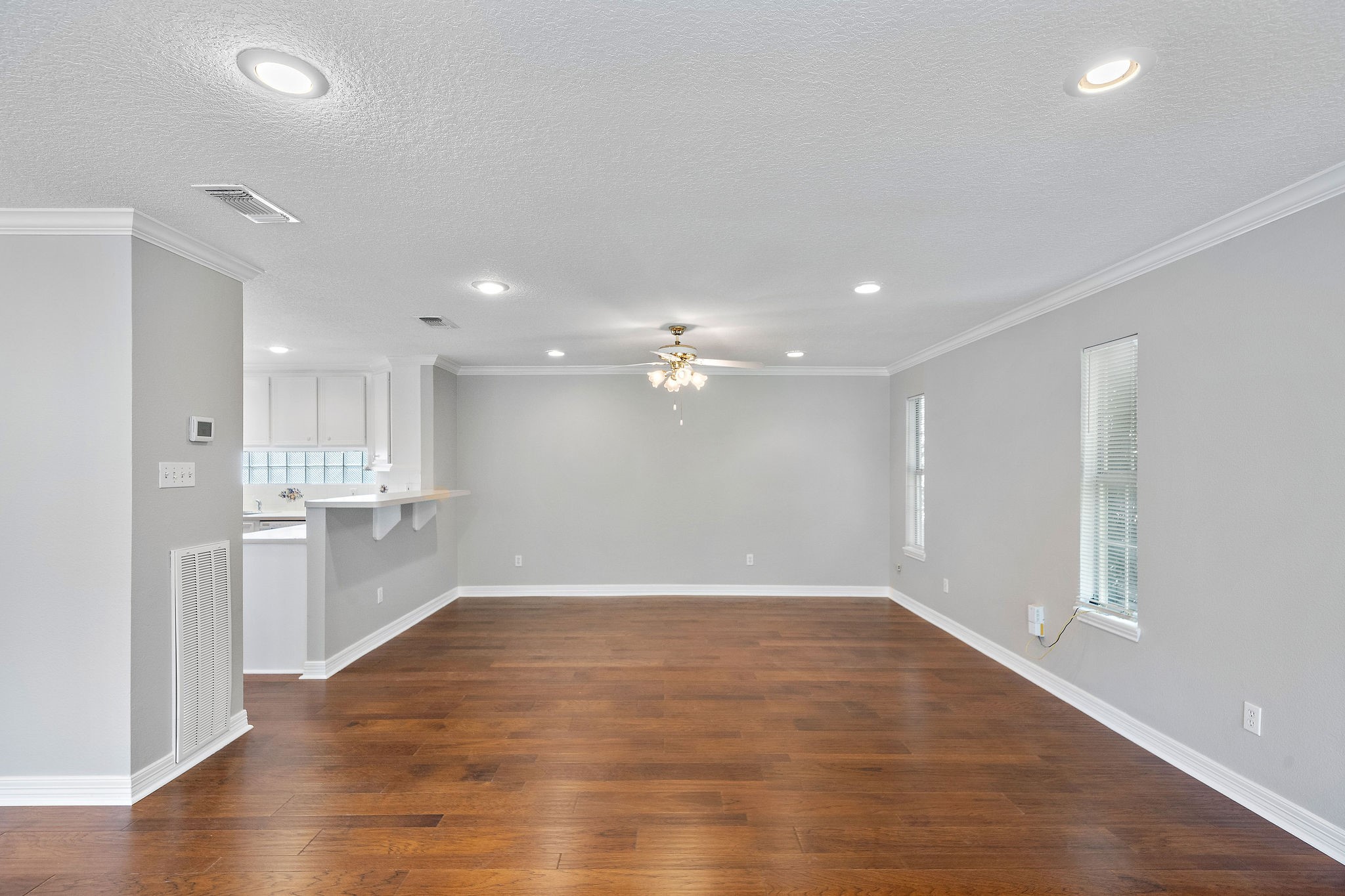 1801 Lexington Street Houston, TX 77098 - Photo 27 of 50 a view of a kitchen with a sink and dishwasher a refrigerator with wooden floor