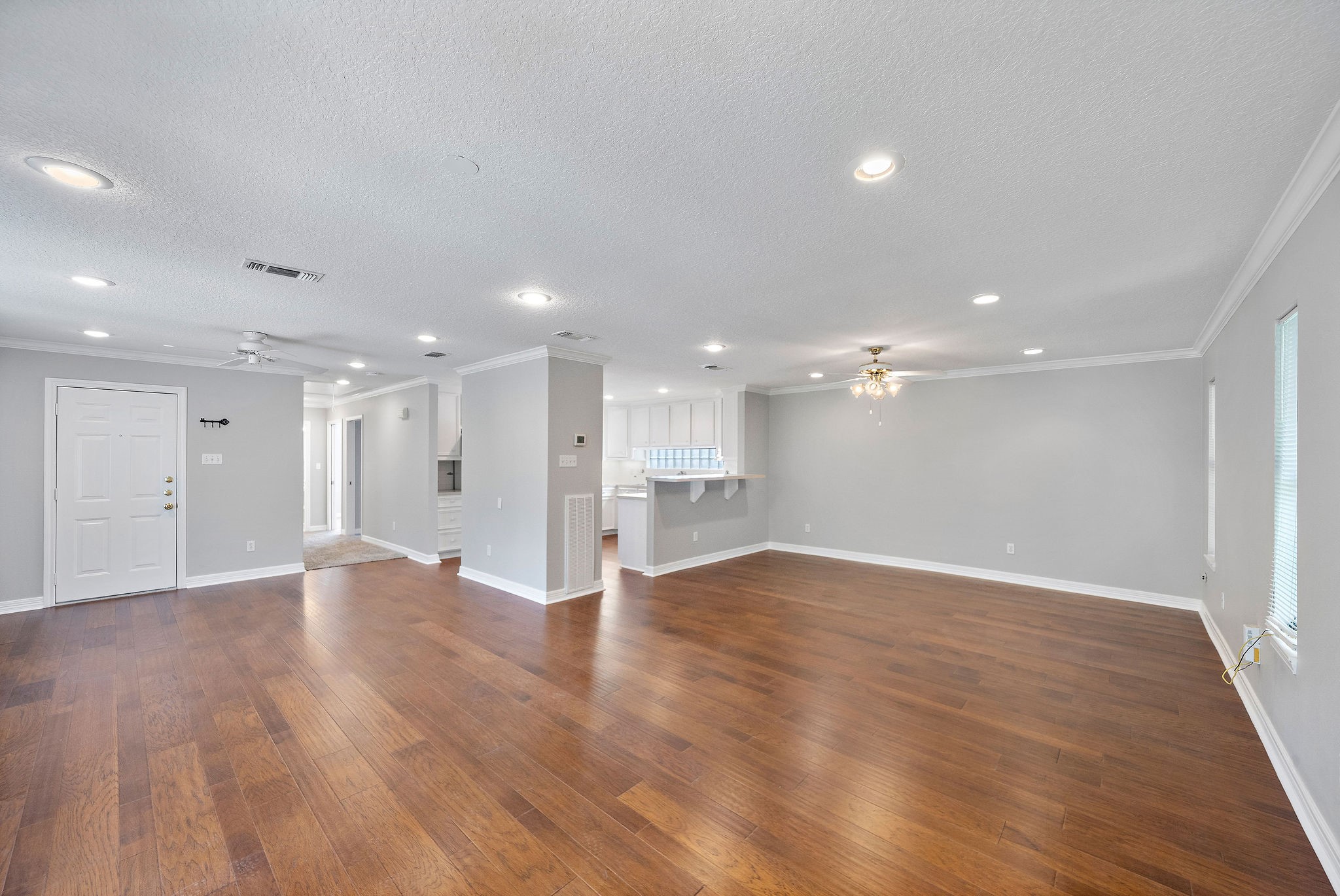 1801 Lexington Street Houston, TX 77098 - Photo 28 of 50 a view of an empty room with wooden floor