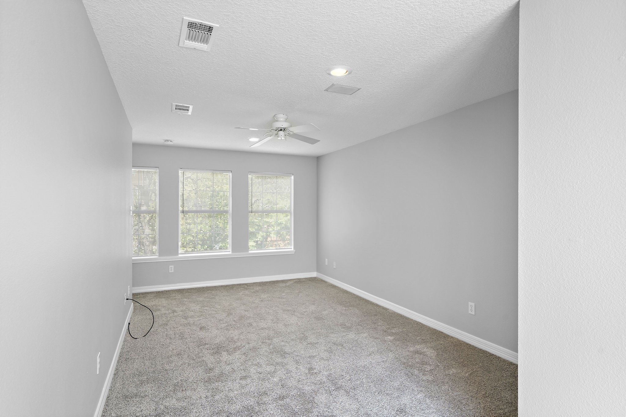 1801 Lexington Street Houston, TX 77098 - Photo 33 of 50 an empty room with a empty space and windows