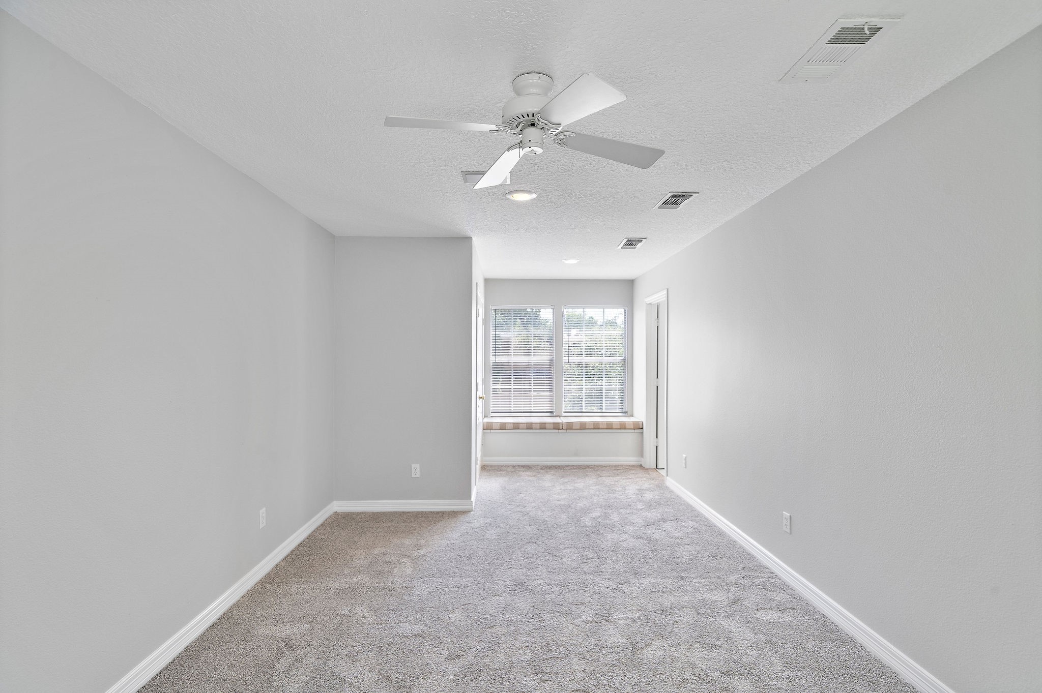 1801 Lexington Street Houston, TX 77098 - Photo 35 of 50 wooden floor in an empty room with a window
