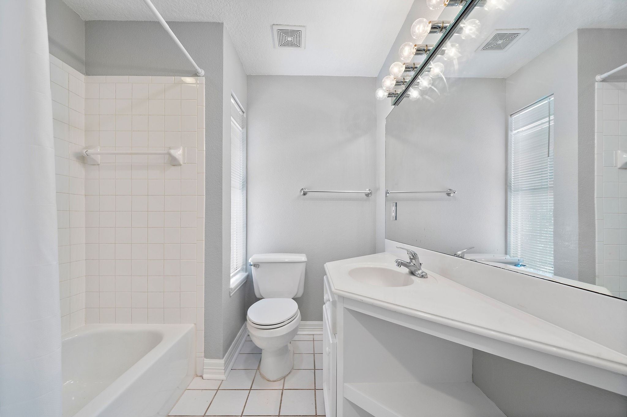 1801 Lexington Street Houston, TX 77098 - Photo 38 of 50 a bathroom with a sink a toilet and shower