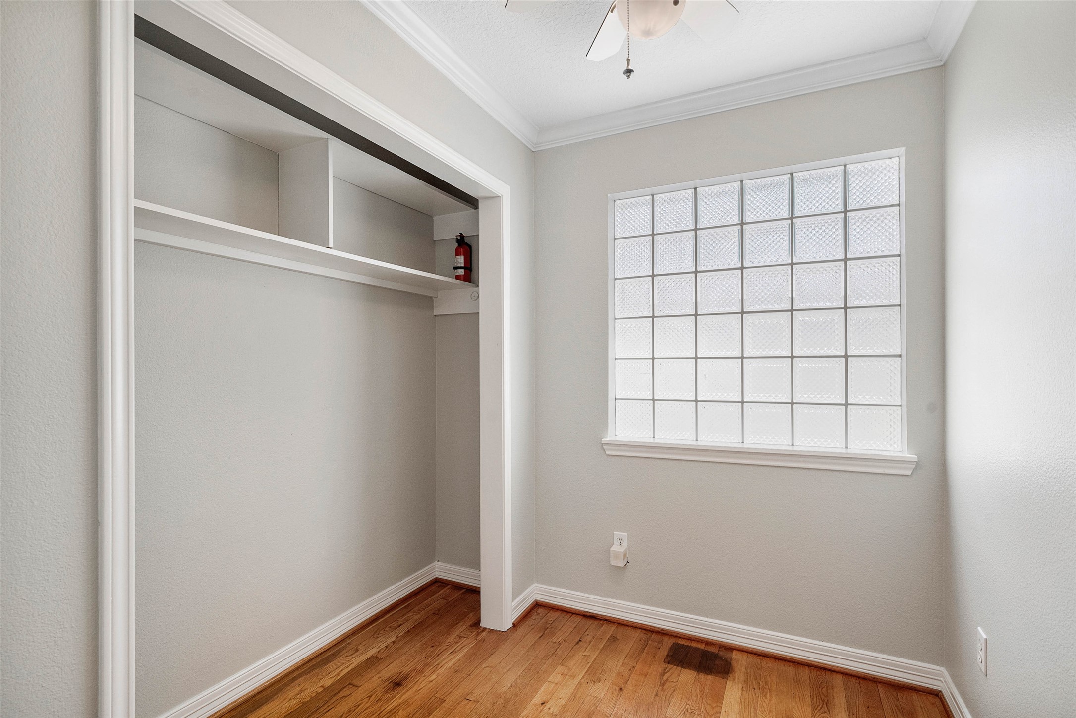 1801 Lexington Street Houston, TX 77098 - Photo 44 of 50 a view of a small space with wooden floor and a window