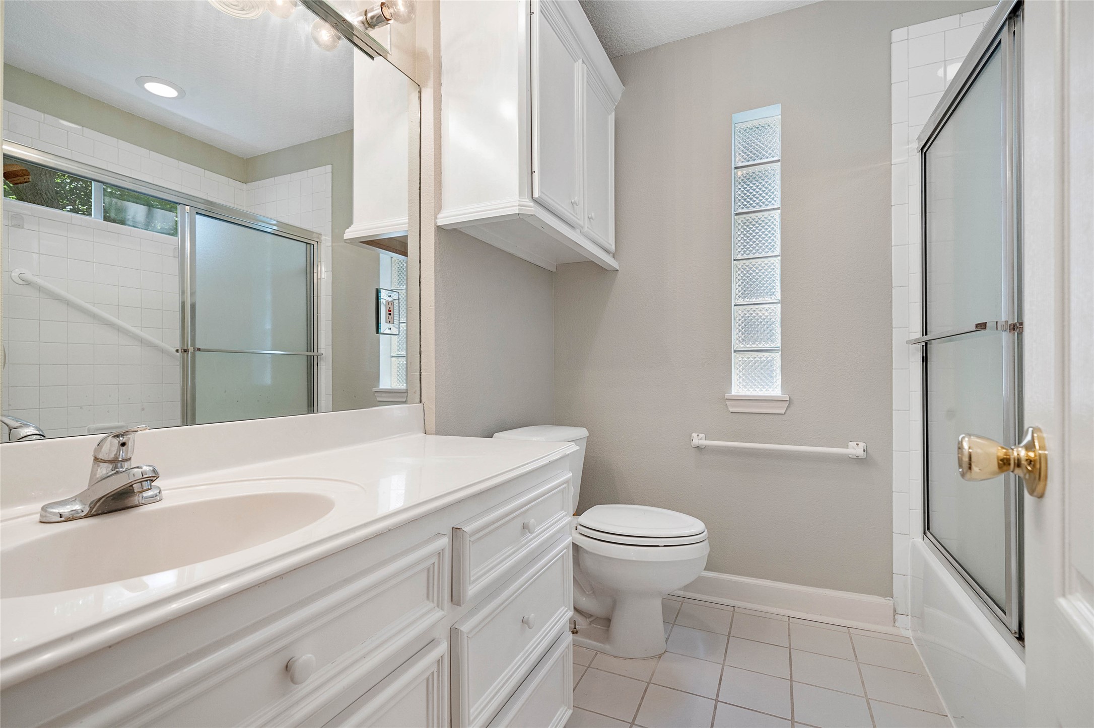 1801 Lexington Street Houston, TX 77098 - Photo 48 of 50 a bathroom with a sink toilet and vanity