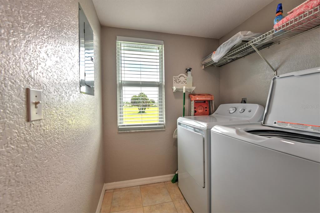 449 Royal Poinciana, Unit 221 Punta Gorda, FL 33955 - Photo 15 of 17 a utility room with dryer and washer