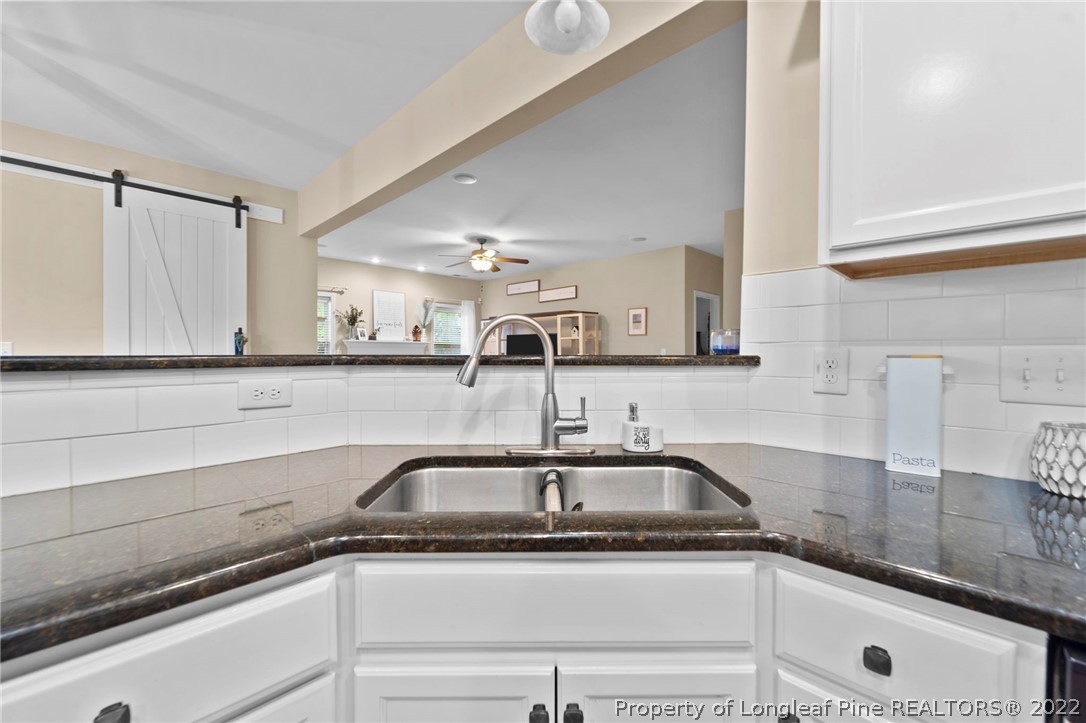 60 Shellbark Drive Spring Lake, NC 28390 - Photo 12 of 42 a close view of a sink a counter and cabinets in the kitchen