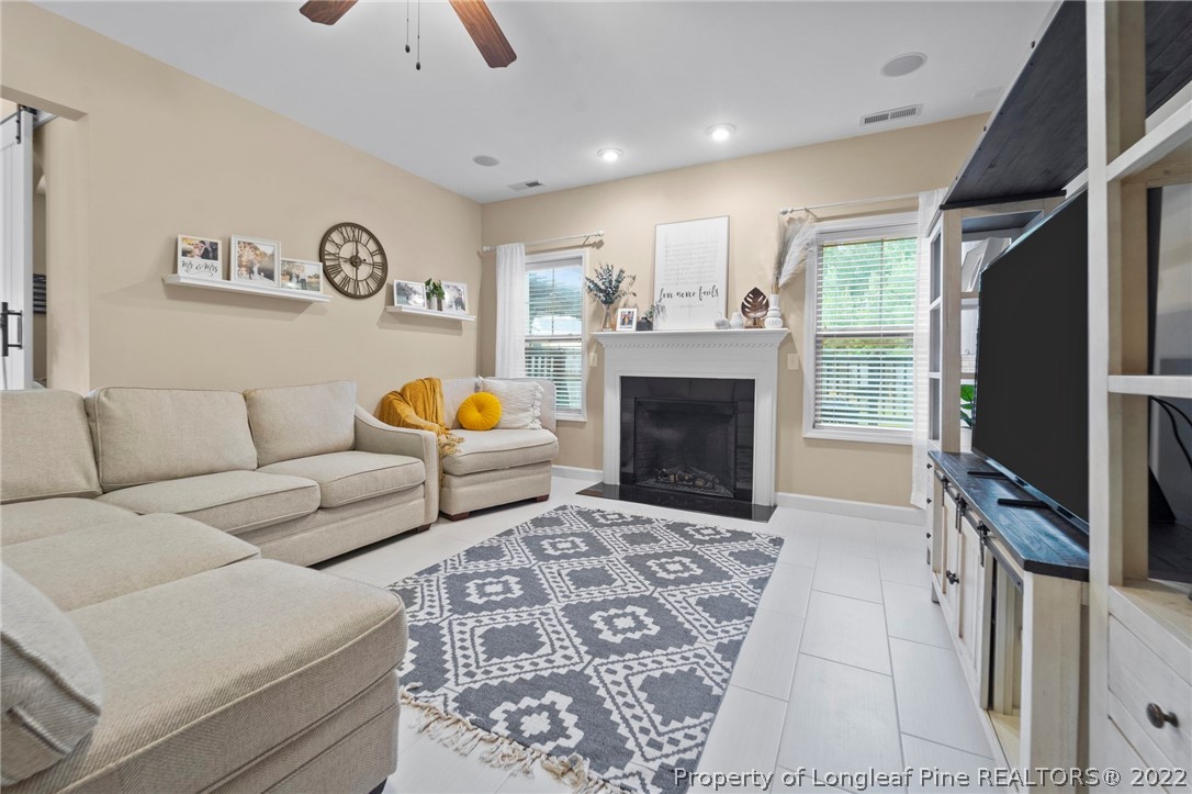 60 Shellbark Drive Spring Lake, NC 28390 - Photo 17 of 42 a living room with furniture and a fireplace