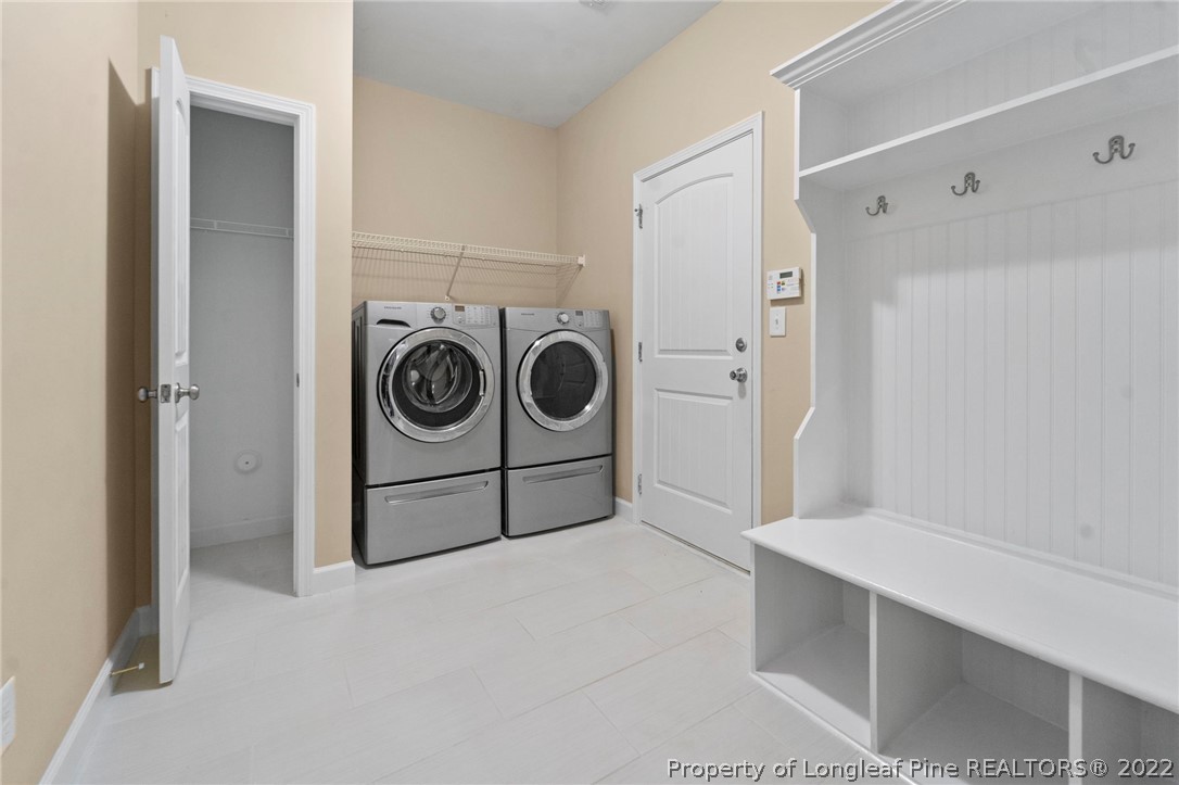 60 Shellbark Drive Spring Lake, NC 28390 - Photo 24 of 42 a utility room with dryer and washer