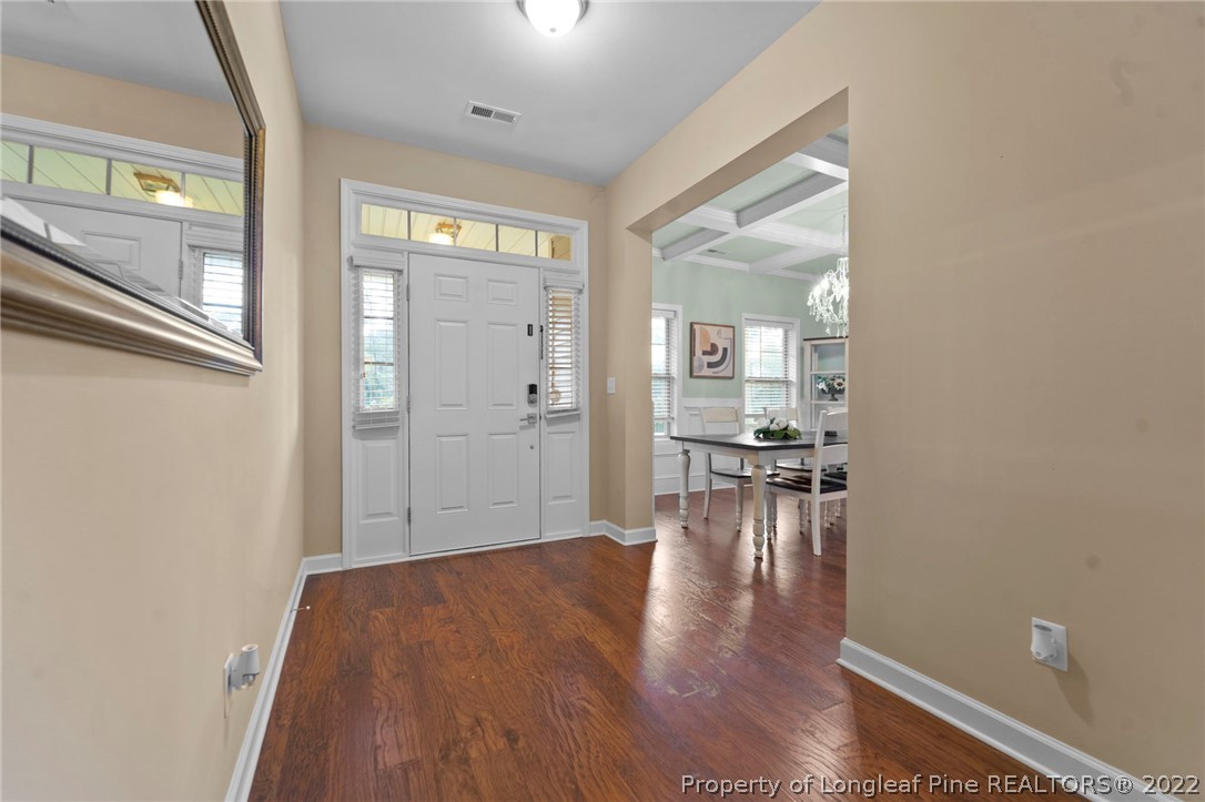 60 Shellbark Drive Spring Lake, NC 28390 - Photo 7 of 42 a view of livingroom with hardwood floor and a ceiling fan