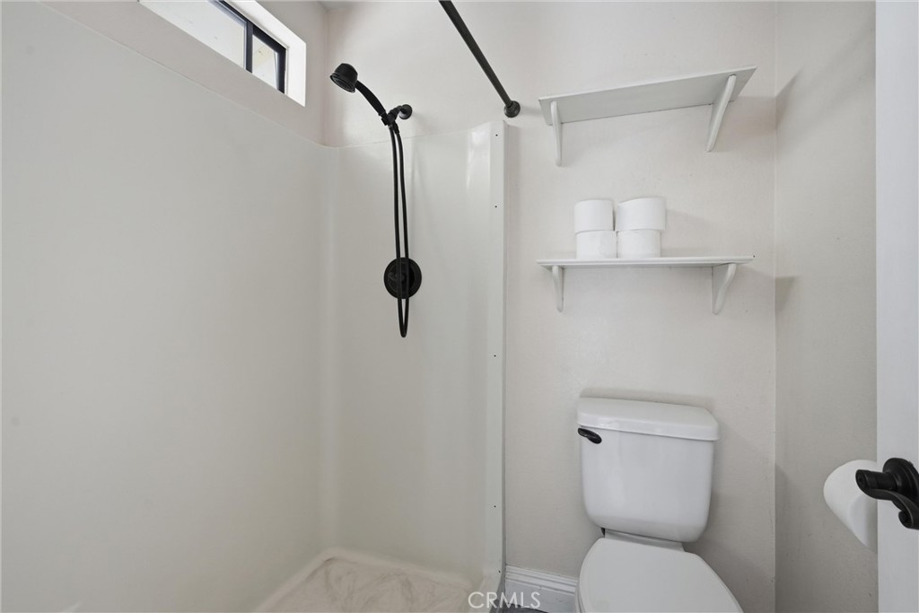 19176 Stonegate Road Hidden Valley Lake, CA 95467 - Photo 14 of 26 Primary bathroom has step in shower.