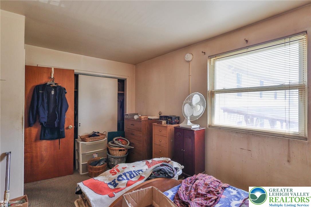 802 West Berwick Street Easton, PA 18042 - Photo 50 of 54 a bedroom with a bed and a window