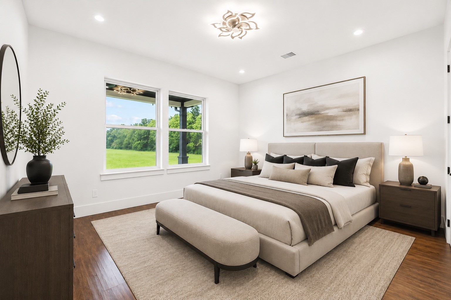 3237 Harkey Road Pearland, TX 77584 - Photo 7 of 46 *Virtually Staged*
Elegant primary suite featuring rich wood like flooring, designer lighting, oversized windows with peaceful property views, and a sophisticated contemporary design.