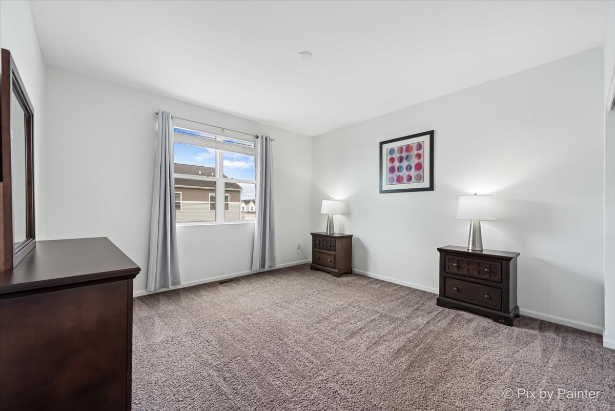 462 Comstock Road South Elgin, IL 60177 - Photo 18 of 23 a view of a workspace with furniture and a window