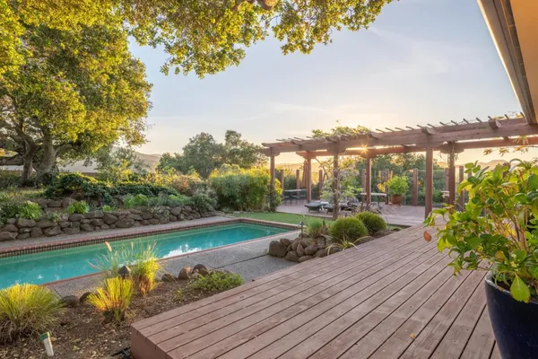 a view of a lake with a yard