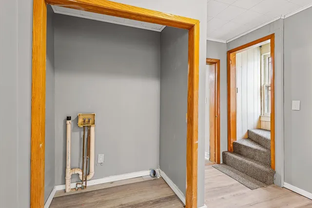 a view of an empty room and window