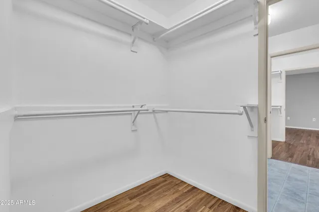 a view of an empty walk in closet