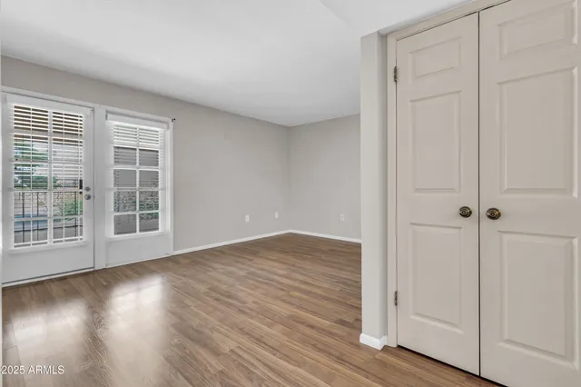 a view of yard with swimming pool and green space