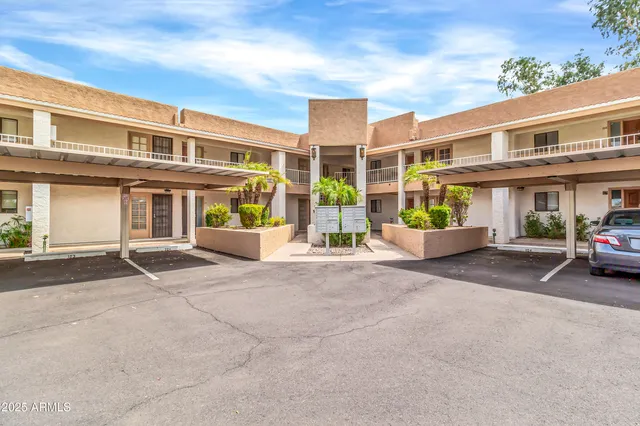 a view of a house with a door and a large window