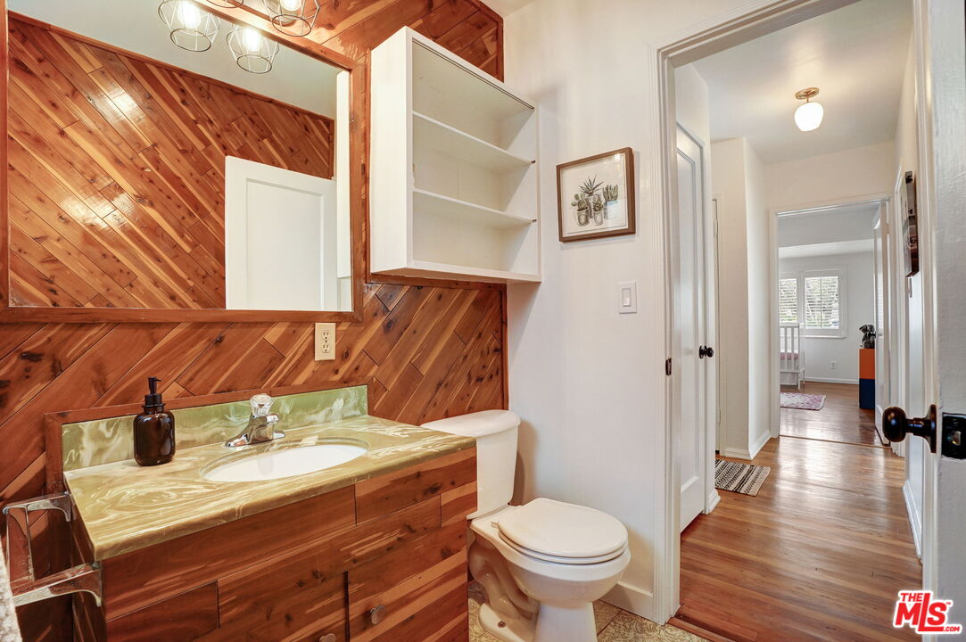 6215 West 77th Street Los Angeles, CA 90045 - Photo 16 of 23 a bathroom with a sink and a toilet
