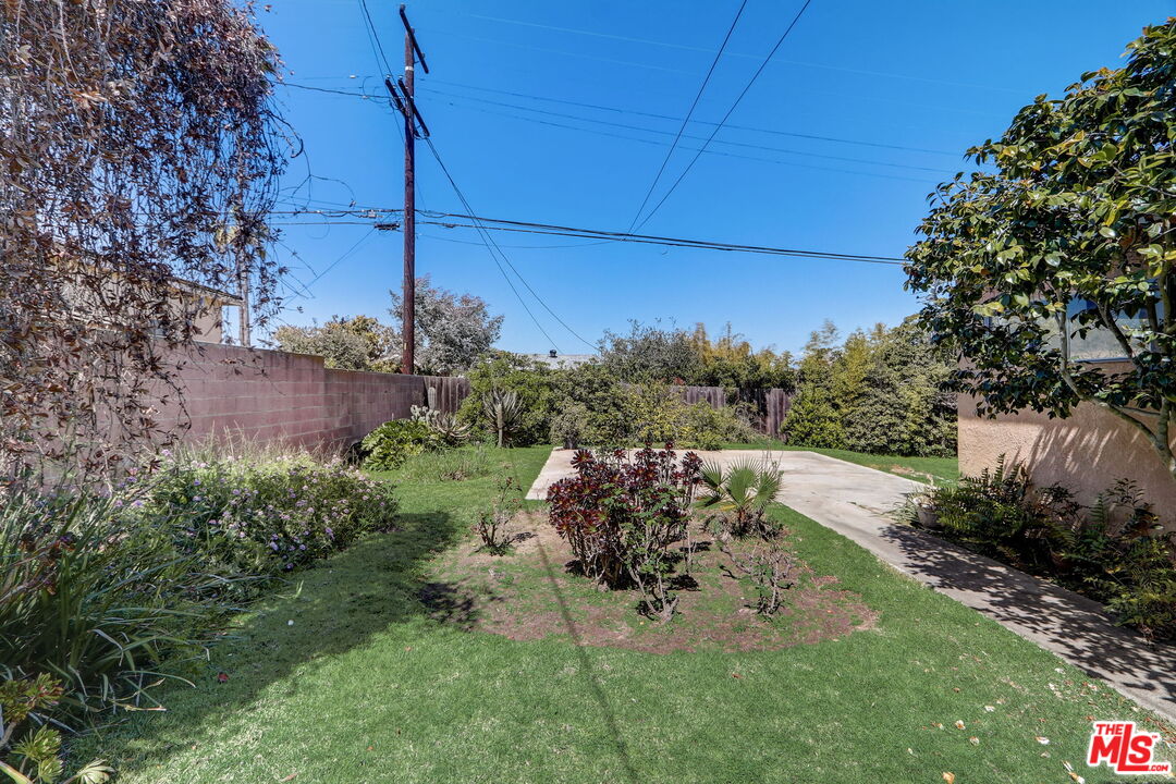 6215 West 77th Street Los Angeles, CA 90045 - Photo 18 of 23 a view of a backyard