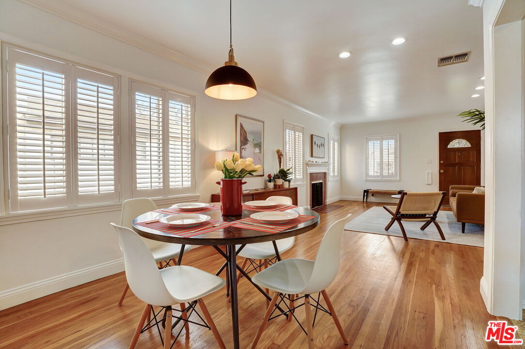 6215 West 77th Street Los Angeles, CA 90045 - Photo 8 of 23 a view of a dining room with furniture and wooden floor