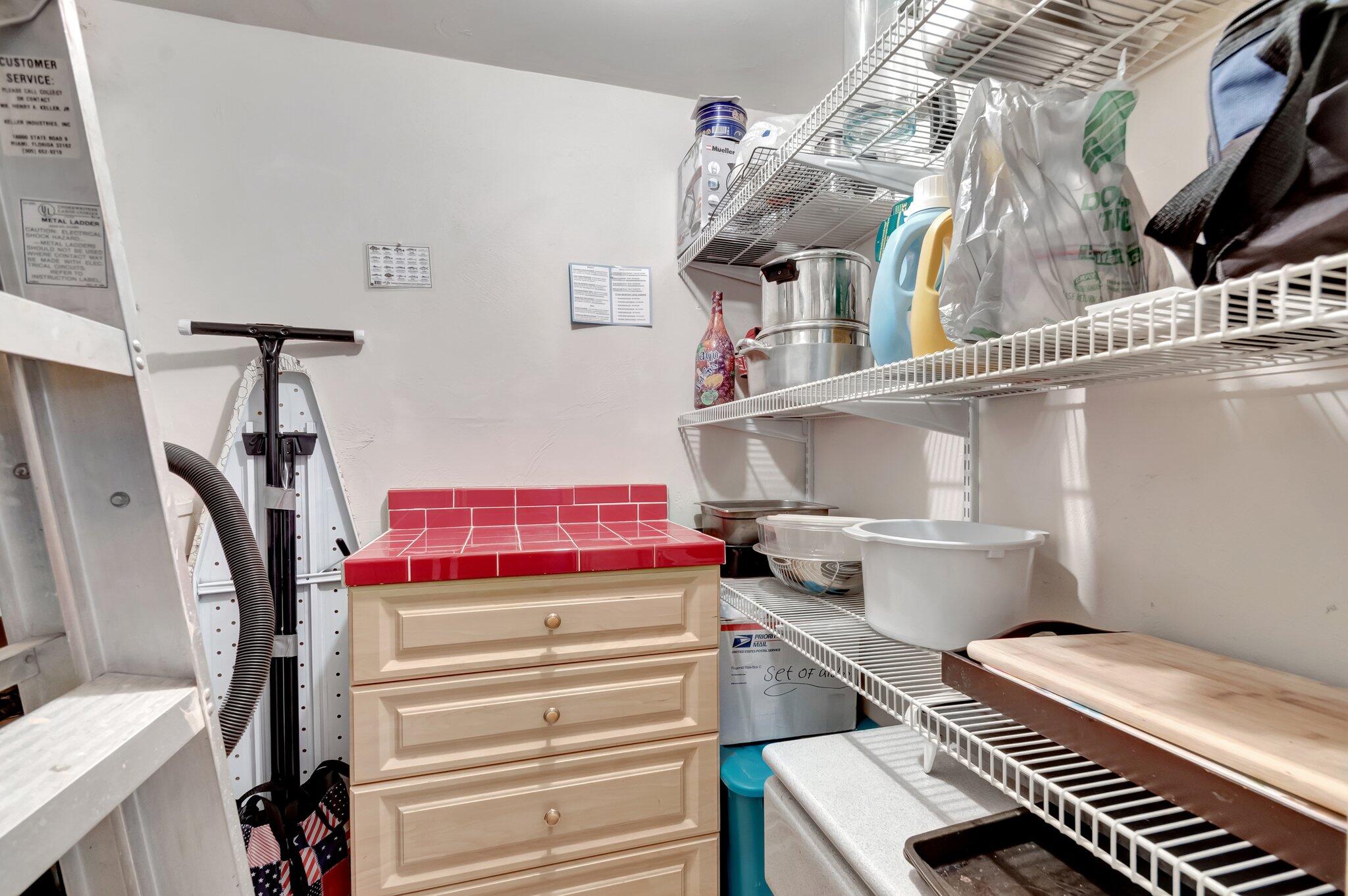 5550 North Ocean Boulevard, Unit 107 Ocean Ridge, FL 33435 - Photo 26 of 38 Pantry/Utility closet
