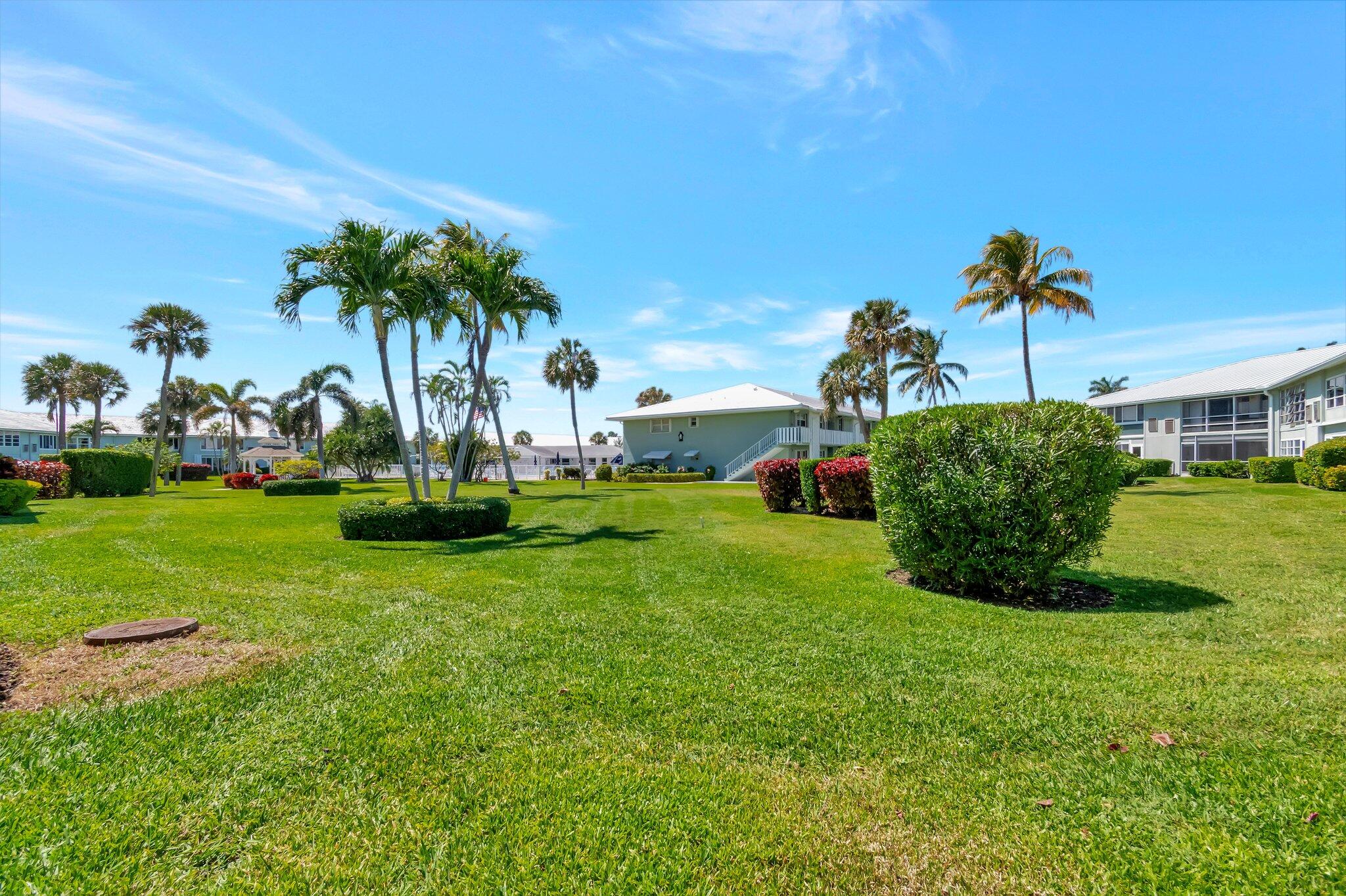 5550 North Ocean Boulevard, Unit 107 Ocean Ridge, FL 33435 - Photo 33 of 38 Corutyard to pool