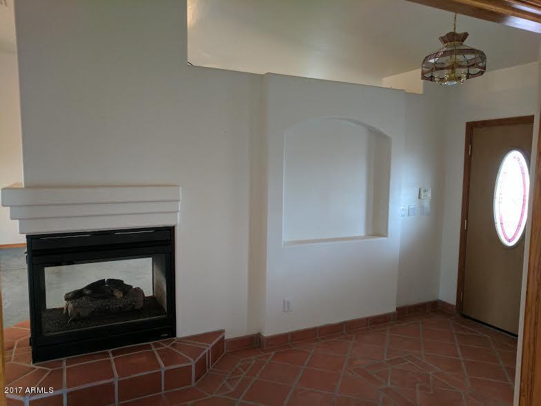 34410 West Eclipse Road Stanfield, AZ 85172 - Photo 12 of 48 Front Entry & Fieplace